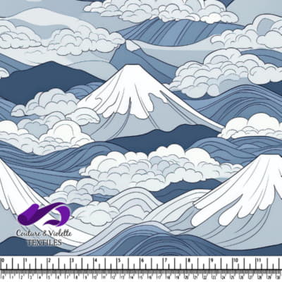 Blue mountains with snow caps and swirling clouds