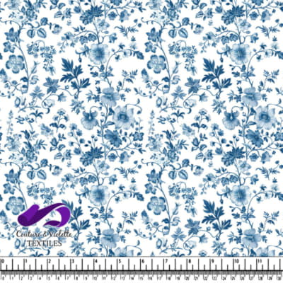 Blue and white floral textile pattern with delicate vines