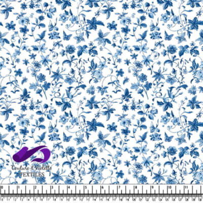 Blue and white floral textile pattern with butterflies
